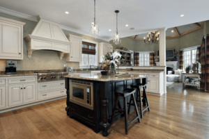 Traditional kitchen with granite countertops and chandeliers